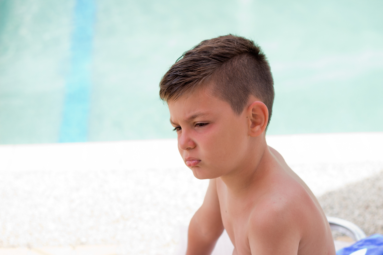 Nervous Boy At Swimming Pool